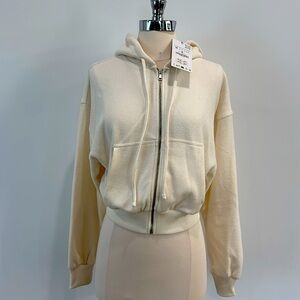 Soft hoodie sweatshirt with pockets and front zipper.
